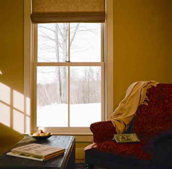 An overstuffed red chair invites people into the cozy study. “This is our smallest room, and it’s a haven,” Michele says. “It’s the place one of us is likely to go for a nap.”